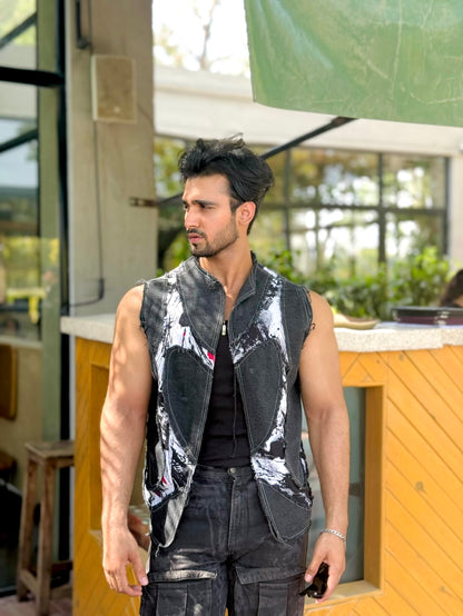 DISTRESSED DENIM VEST