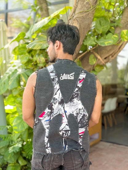 DISTRESSED DENIM VEST